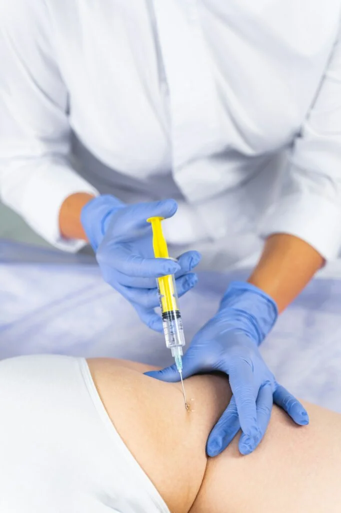 Female patient getting rid of stretch marks